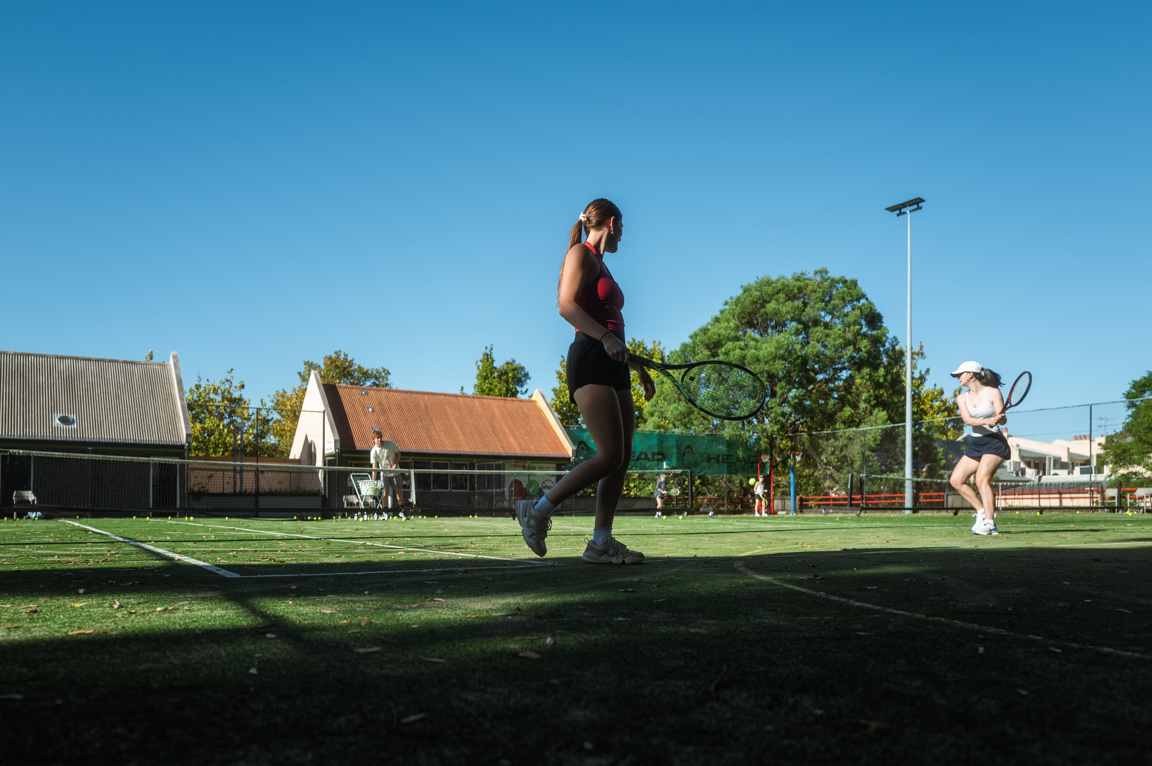 Group tennis coaching at LoveAll Tennis, North Sydney