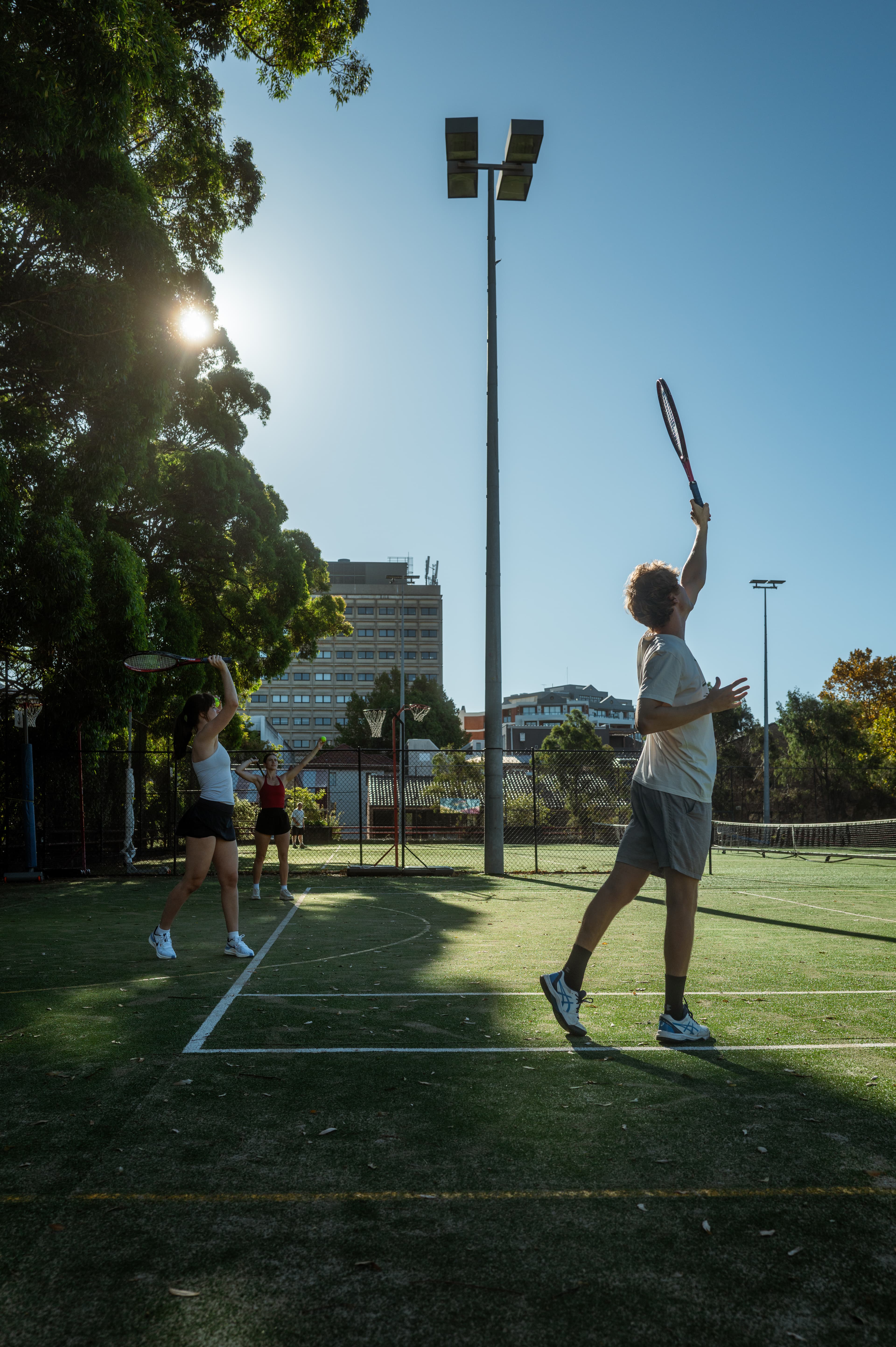Teaching serves at LoveAll Tennis, North Sydney